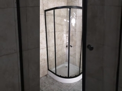 5mm clear glass shower enclosure with black profile and sector shower tray